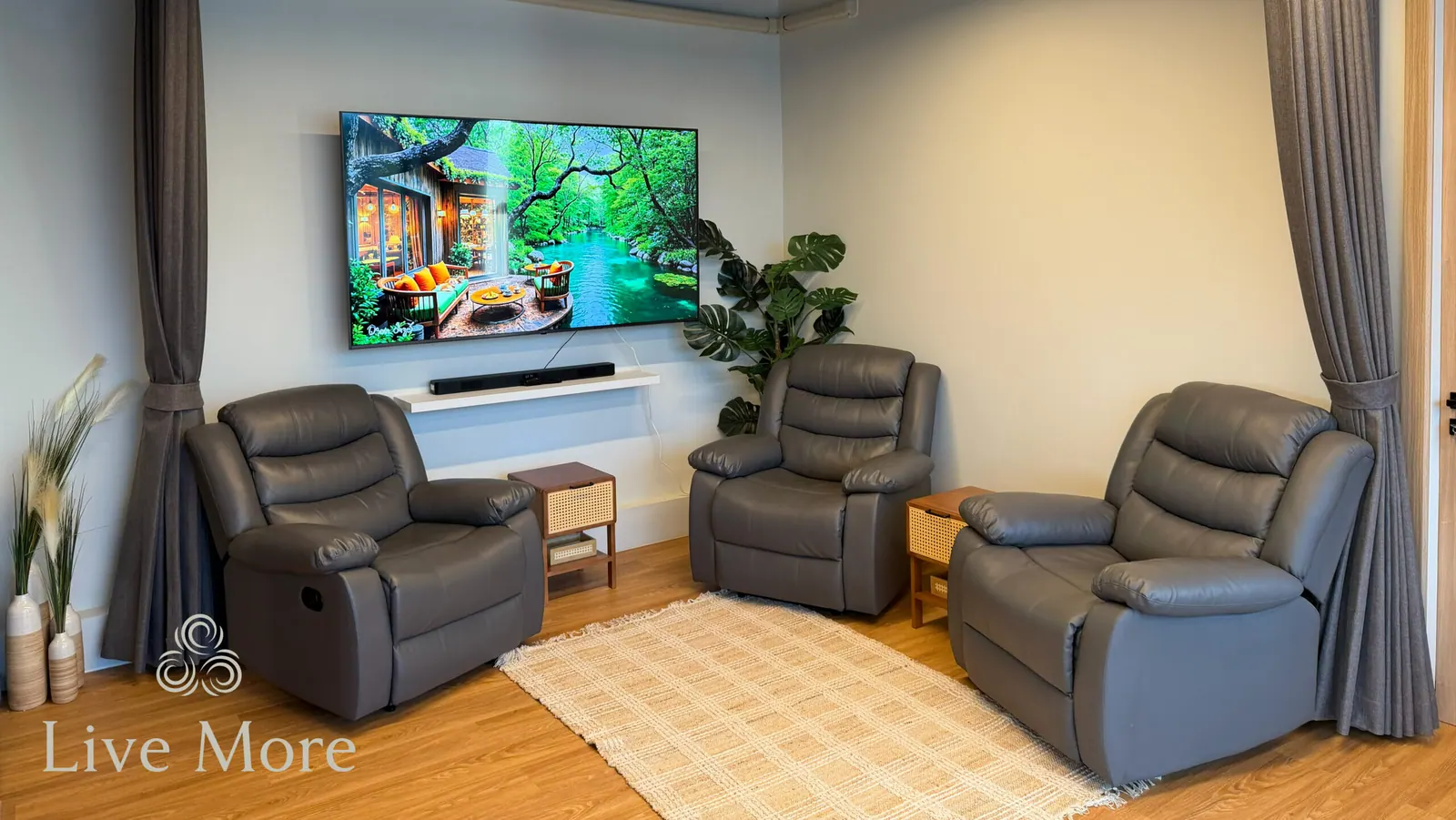 Inside the Live More lifestyle clinic at KĀHLĪ Phuket, with recliners facing a wall-mounted screen