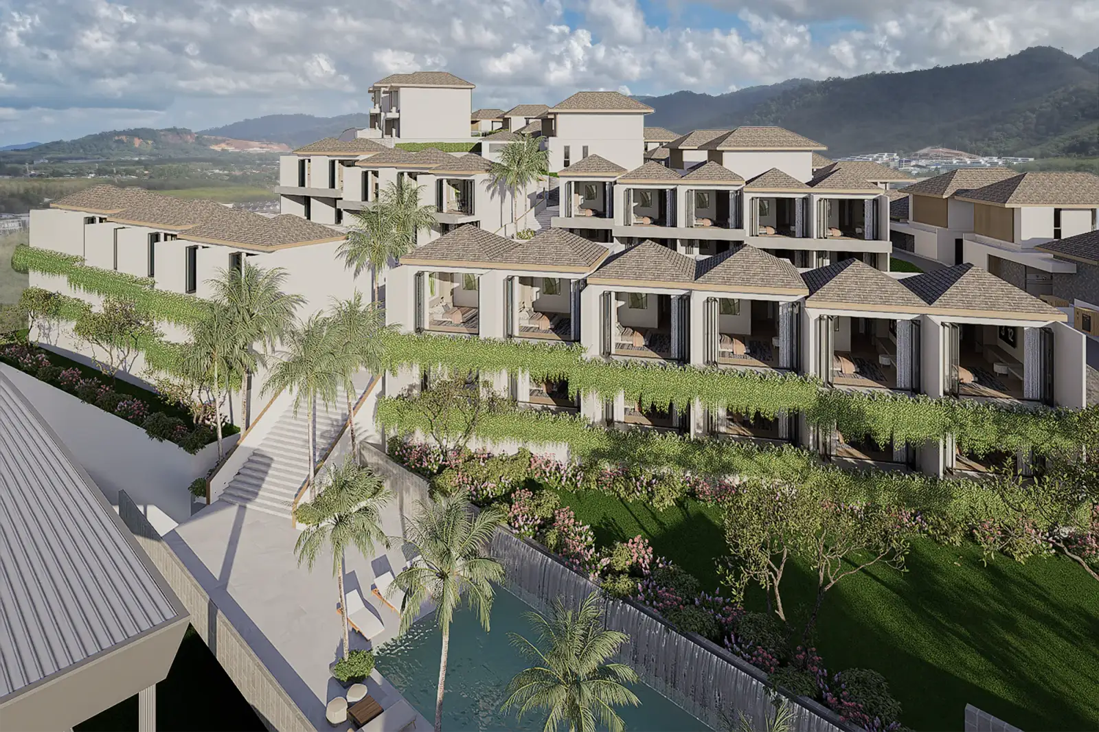 ภาพมุมสูงของ KĀHLĪ Hillside Villas ไล่ระดับลงตามเนินเขา โอบล้อมด้วยรีสอร์ตและแนวเขาเบื้องหลัง
